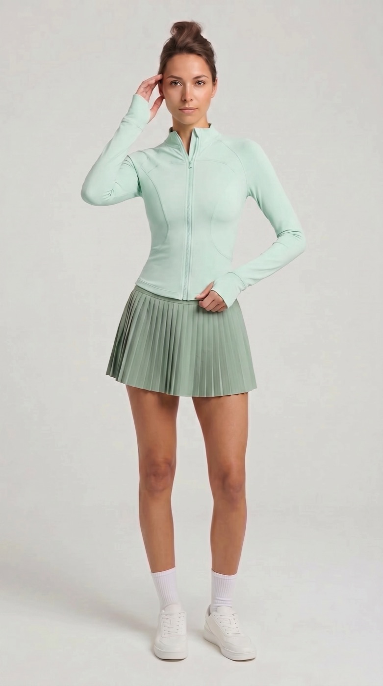 Zip jacket in pistachio with sage pleated skirt